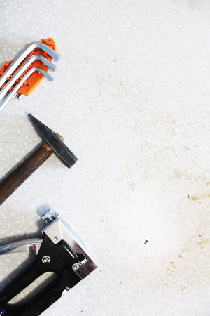 Concept background on the theme of construction and renovation. Hammer screwdriver construction...