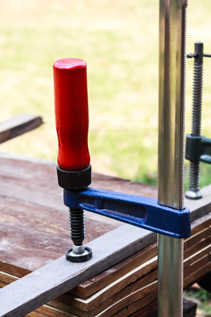 carpenter screw clamp tools pressing wood slatsの写真素材