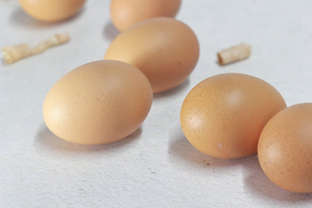 Eggs on a white background. Close-up. Selective focus.