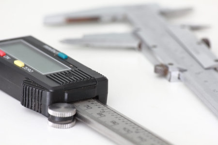 Vernier caliper and a caliper on a white background
