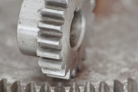 Closeup of gear wheel. Macro photo of gear wheel mechanism.