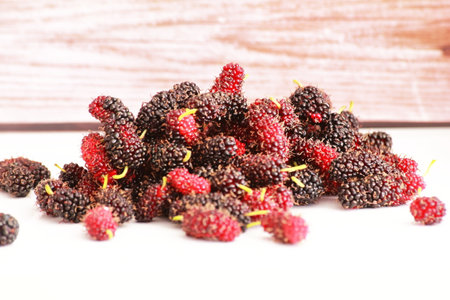 Mulberry fruit on white background. Fresh mulberry fruits.の写真素材