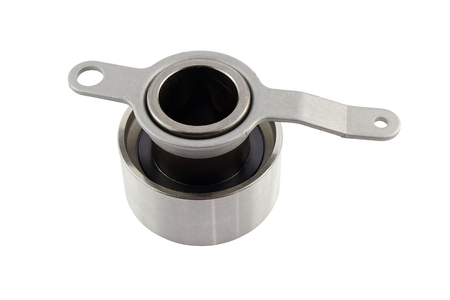 timing belt tensioner pulley roller bearing isolated on white backgroundの写真素材