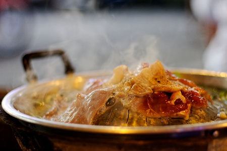grill pork, Korean Barbecue in Thai Style with smoke (Moo Kratha)の写真素材