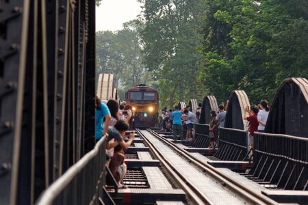 Kanchanaburi, Thailand%u200B -%u200B December%u200B 29, 2018%u200B:Picture of Tourist waiting to take picture with Train Cross the bridge%u200B over%u200B the river%u200B Kwai%u200B in Kanchanaburi,The Death Rail Way World War 2のeditorial素材