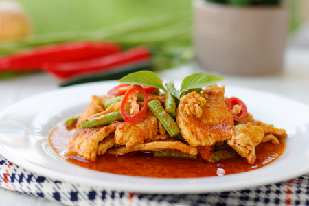 Stir fried chicken and curry pasteの写真素材