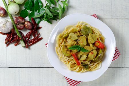 Spaghetti with Green Curry Sauce with Fish Balls (Spaghetti kaeng Khiao Waan),Thai foodの写真素材