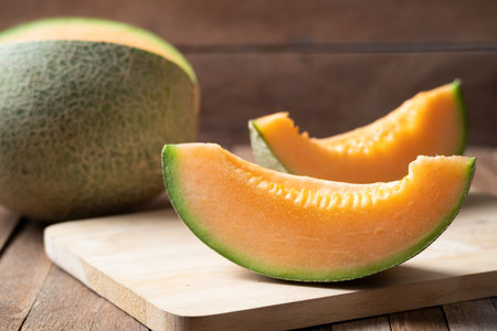 Fresh sliced japanese melon on wood table