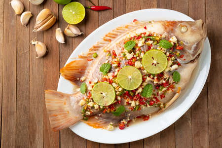 Red Tilapia Fish In Spicy Lime Soupの写真素材