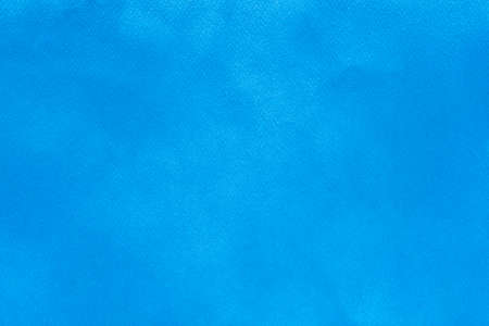 Abstract blue spray paint on paper texture backgroundの写真素材