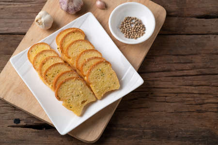 Thai Crispy Garlic Bread on white plate .Thai snack foodの写真素材