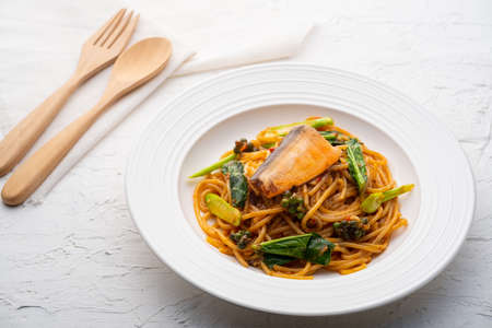 Fusion food.Spaghetti with Tomato Cream Sauce and Canned Mackerelの写真素材