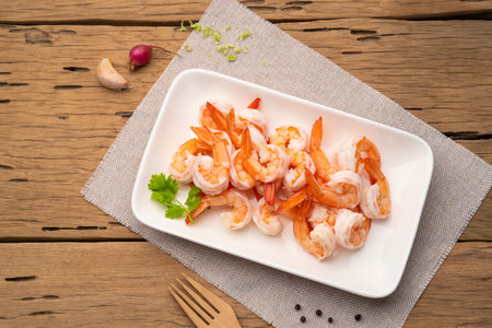 Shrimps, Boiled Prawns in white plate, Shrimp tails ready for cooking,Seafood ingredient.Top viewの写真素材