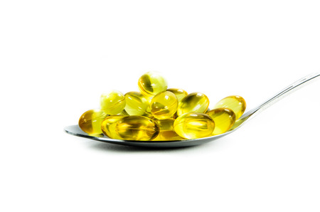 Fish oil in the spoon の写真素材