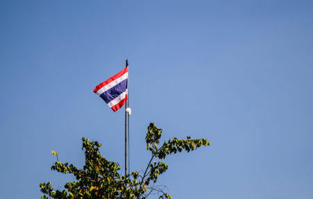 Thailand flag with blue sky の写真素材