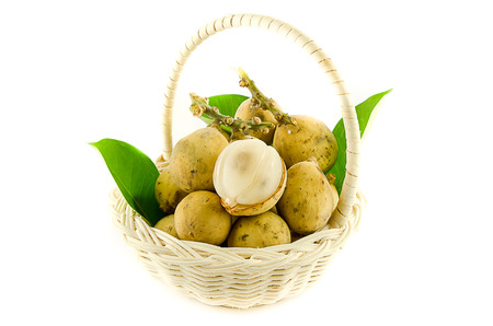 Langsat, Duku in basket on white backgroundの写真素材