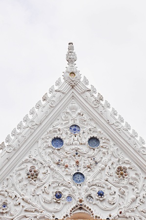 Thai style art pattern on the gable end of templeの写真素材