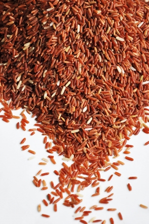Red rice on white backgroundの写真素材