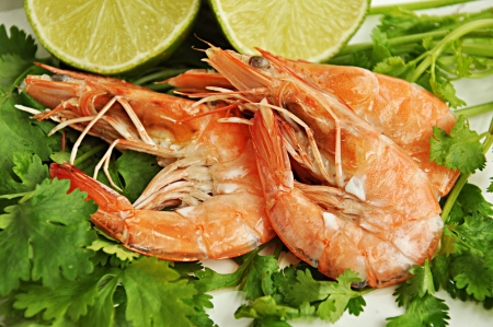Three boiled prawns with vegetableの写真素材
