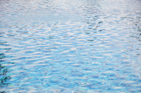 Water in swimming pool as background