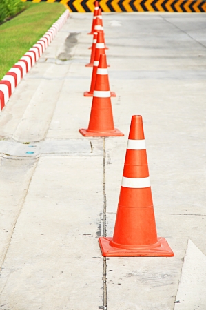 Traffic cones beside concrete streetの写真素材
