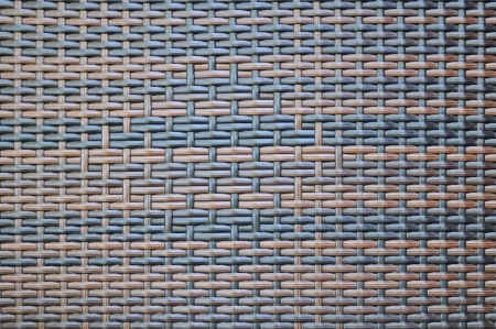Dark brown woven rattan taxture backgroundの写真素材