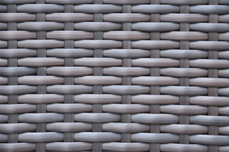 Dark brown woven rattan taxture backgroundの写真素材