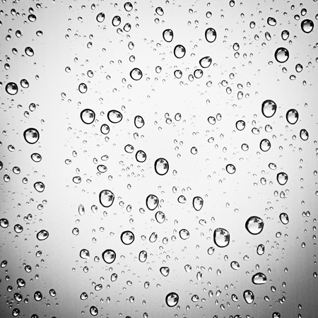 Water drops on gray backgroundの写真素材