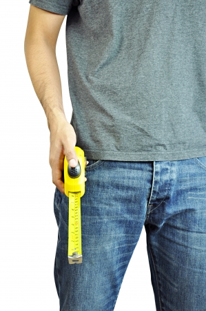 Worker holding a tape measureの写真素材