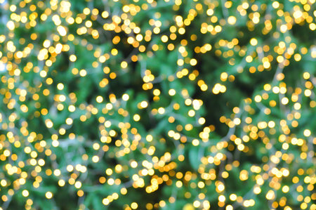 Decorative light on christmas tree - bokeh abstract background