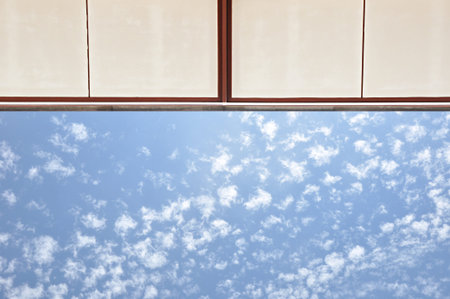 Eaves of house on blue sky background - looking up  angle