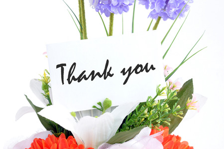 Flower bouquet with " Thank you " on  tag cardの写真素材