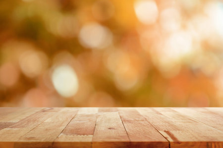 Wood table top on brown bokeh abstract background
