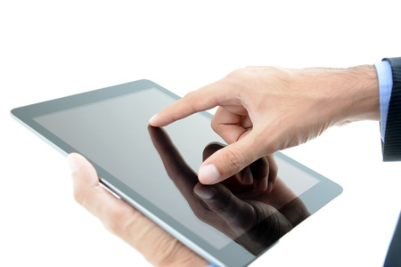Businessman hand touching tablet computerの写真素材