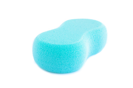 Blue synthetic sponge - isolated on white backgroundの写真素材