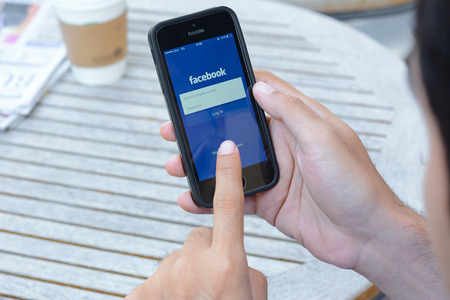 Fackbook application on iphone , Facebook is one of the most famous social networking website from USA that also has application on smart phones.のeditorial素材