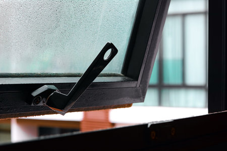 Open window with water drop on the glass - soft focus