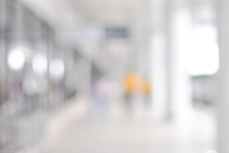 White blur abstract background from building hallway (corridor)の写真素材