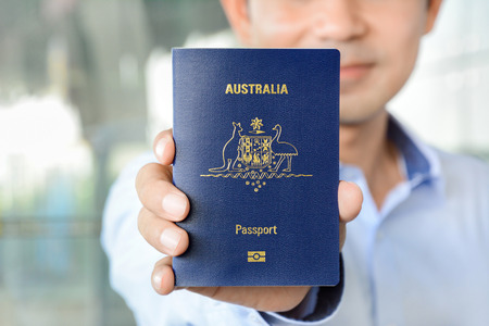 A man showing passport (of Australia)の写真素材