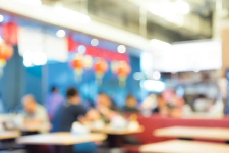 Blurred image of restaurant interior with peopleの写真素材