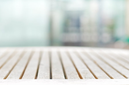 Wood table top on blur gray background - can be used for display or montage your products