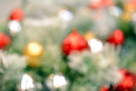 Blur shiny colorful christmas ornaments for backgroundの写真素材