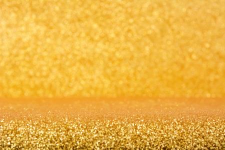 Shiny gold glitter backgroundの写真素材