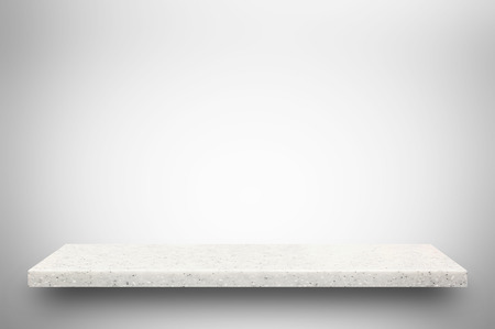 White stone shelf on gradient gray backgroundの写真素材