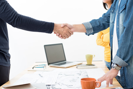 Casual businessmen making handshake at the meetingの写真素材