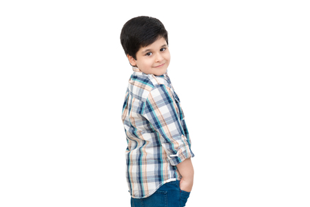 Casual handsome cute Asian boy posing on white backgroundの写真素材