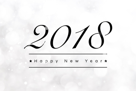Happy New Year 2018 greeting text on abstract shiny bokeh white backgroundの写真素材