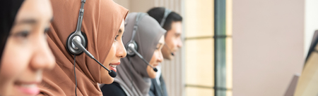 Web banner of muslim customer service operator team working in call center officeの写真素材