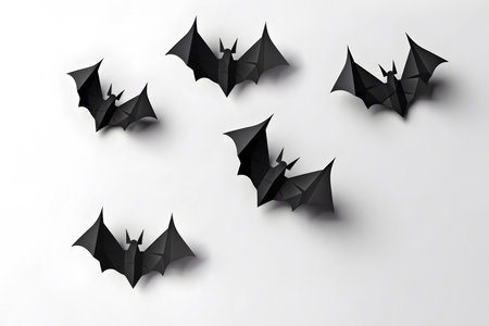 Creative Halloween bat paper cut art  on white gray backgroundの素材