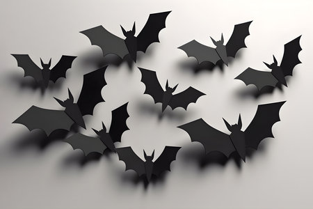 Creative Halloween bat paper cut art  on gray backgroundの素材